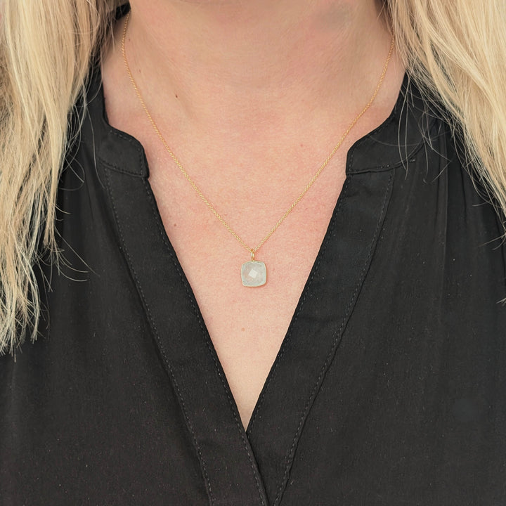 gold plated sterling silver blue topaz cushion pendant necklace