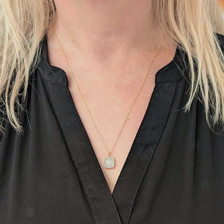 gold plated sterling silver blue topaz cushion pendant necklace