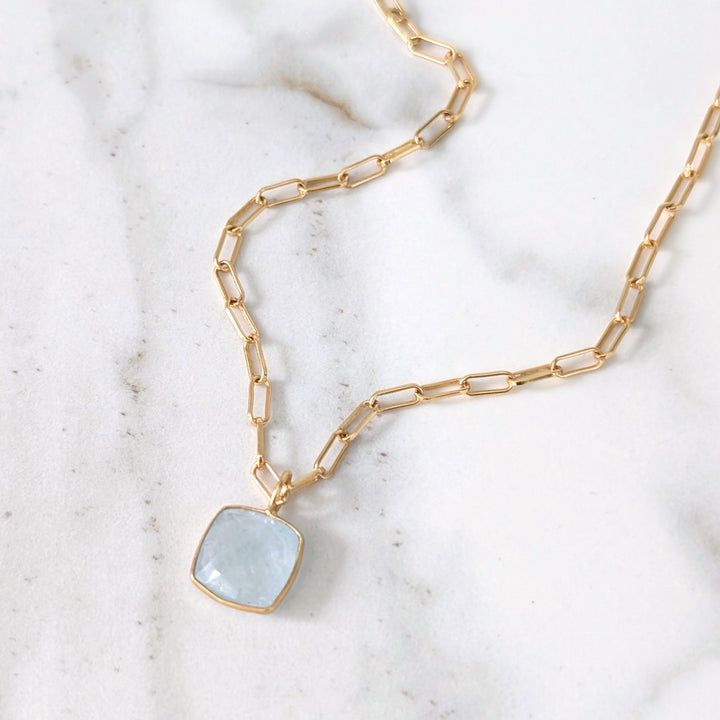 gold plated sterling silver blue topaz cushion pendant necklace