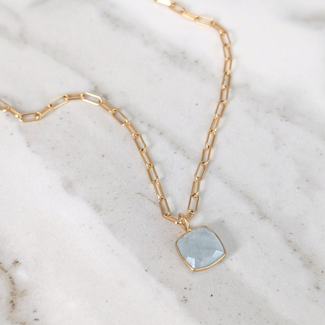 gold plated sterling silver blue topaz cushion pendant necklace