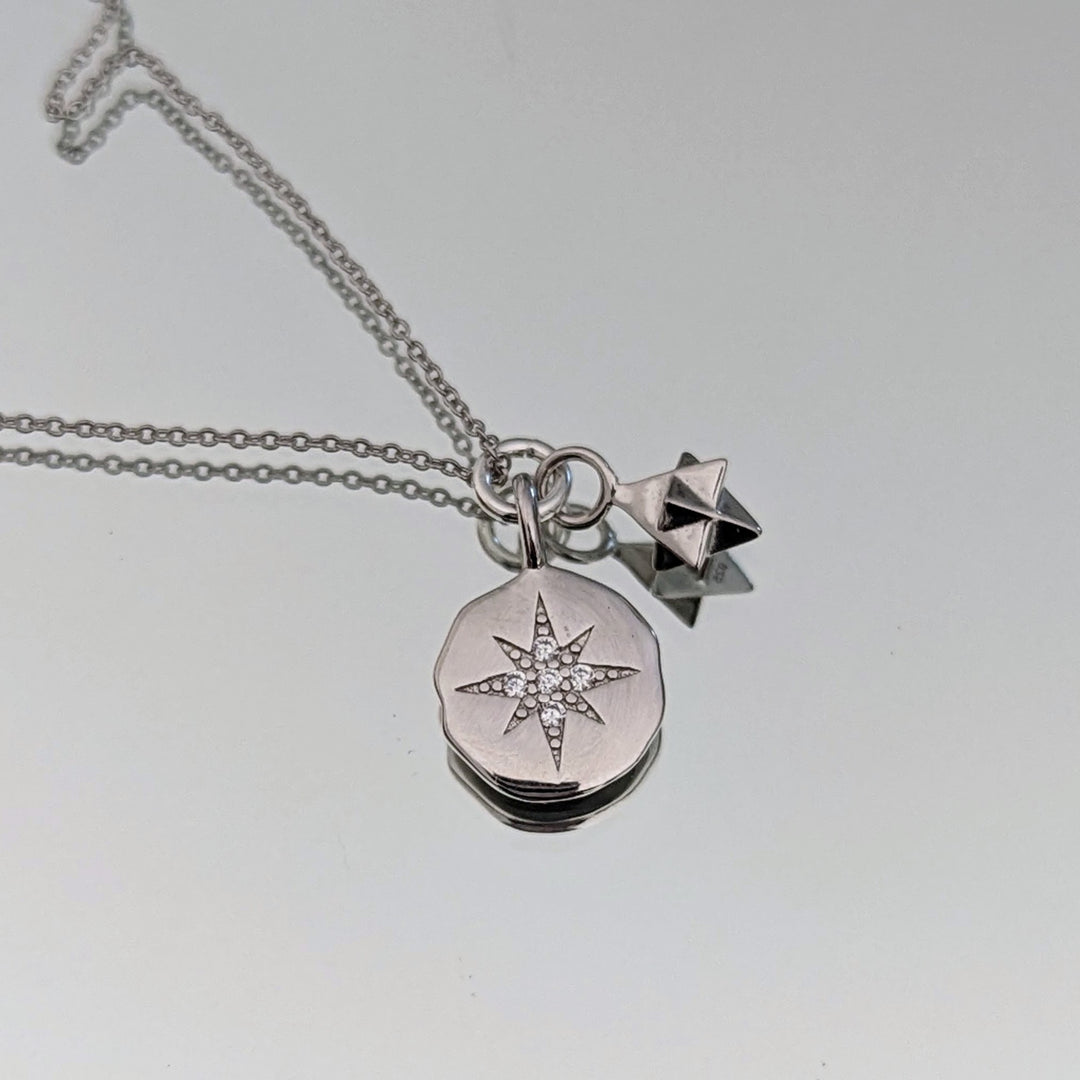 silver star disc and charm necklace