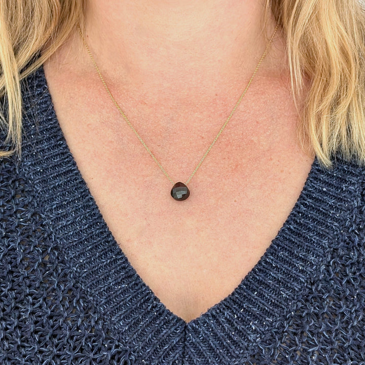 garnet January birthstone necklace on gold chain
