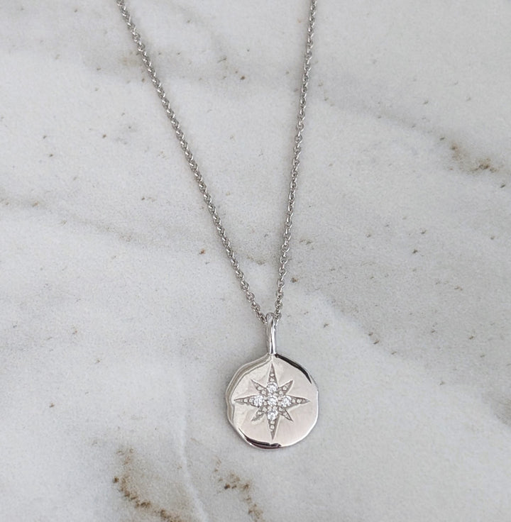 sterling silver starburst disc necklace