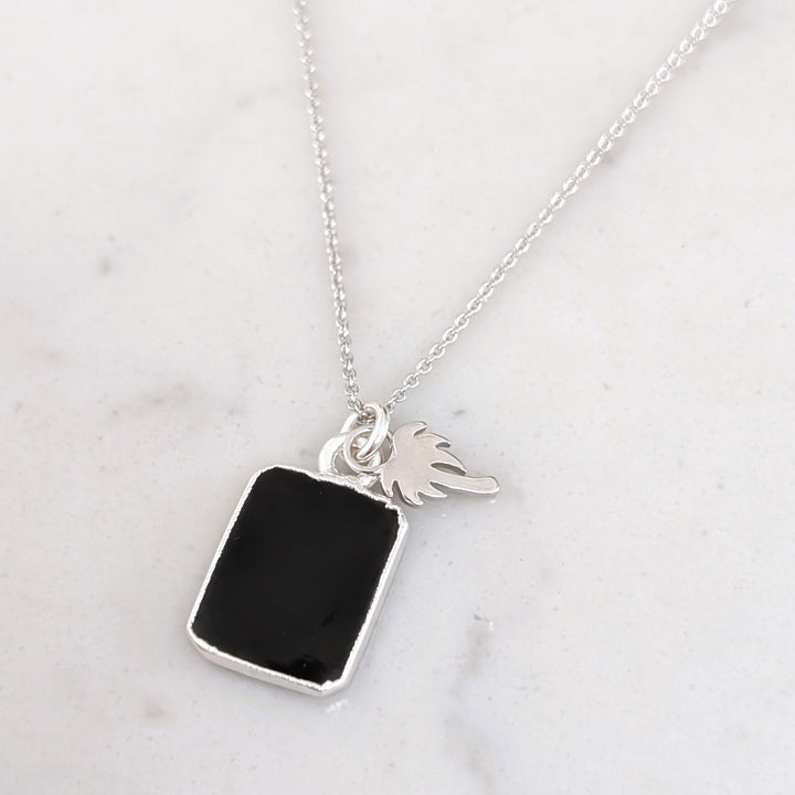 silver black tourmaline and charm pendant necklace