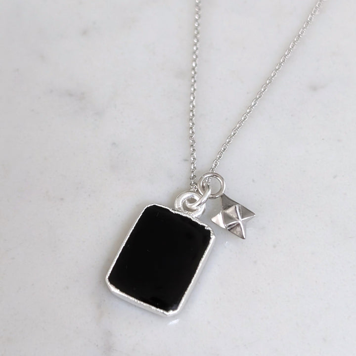 silver black tourmaline and charm pendant necklace