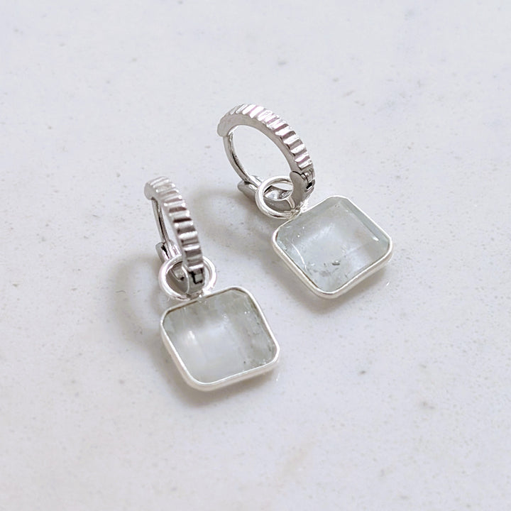 sterling silver blue topaz square charm hoop earrings