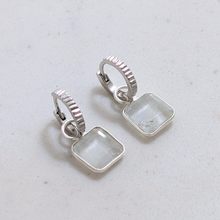 sterling silver blue topaz square charm hoop earrings