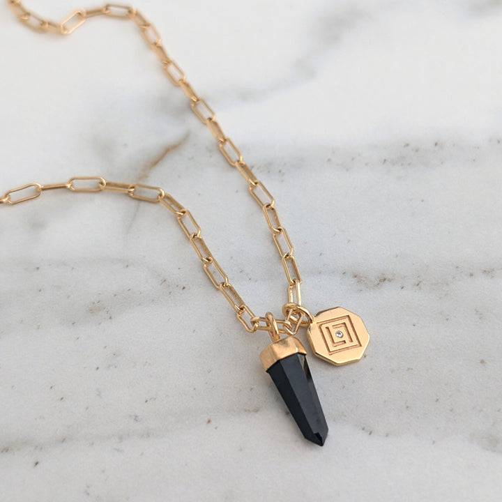 gold and black tourmaline spike gemstone pendant necklace on a paperclip chain