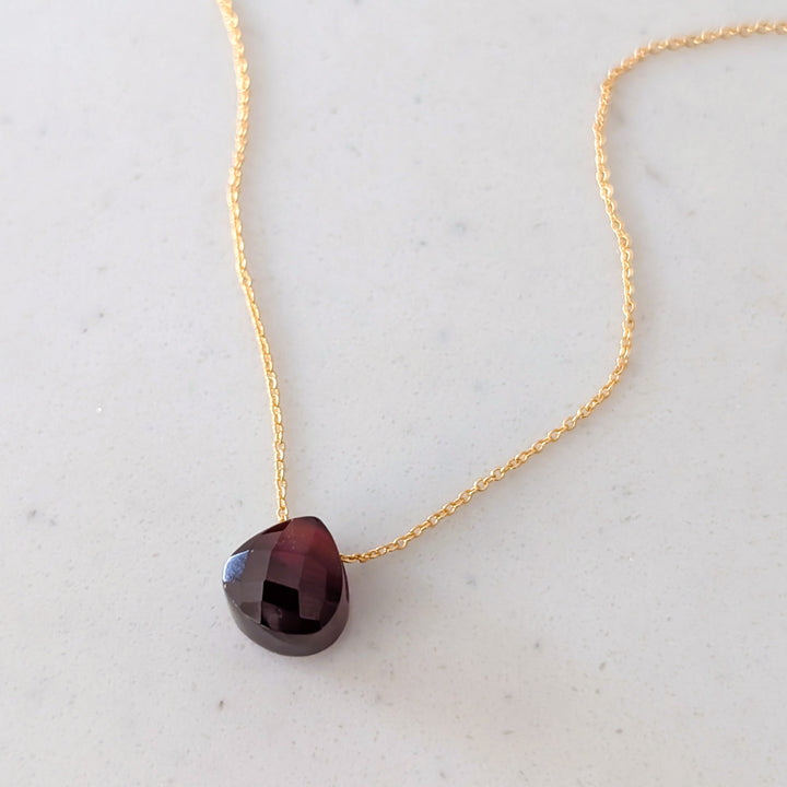 garnet January birthstone necklace on gold chain