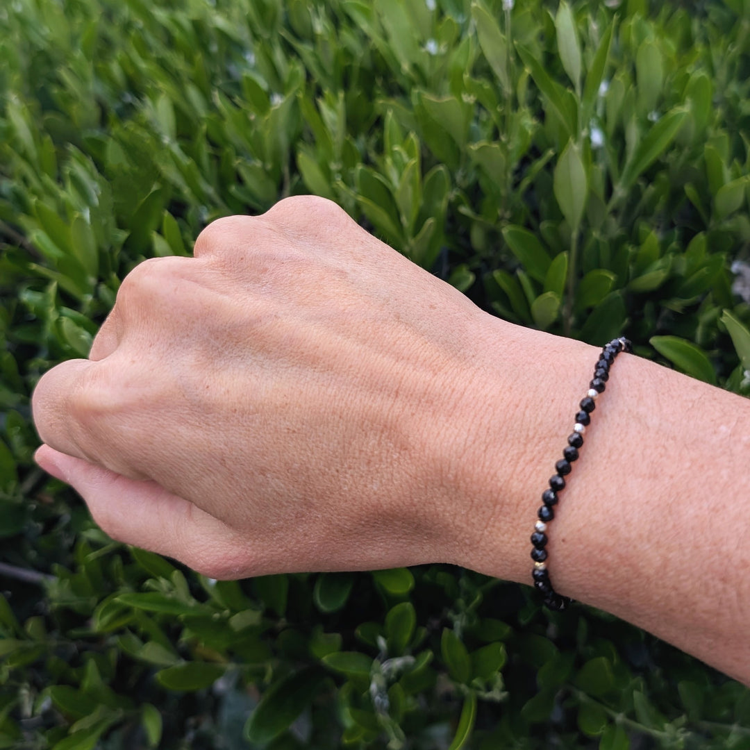 black tourmaline and gold bead gemstone bracelet