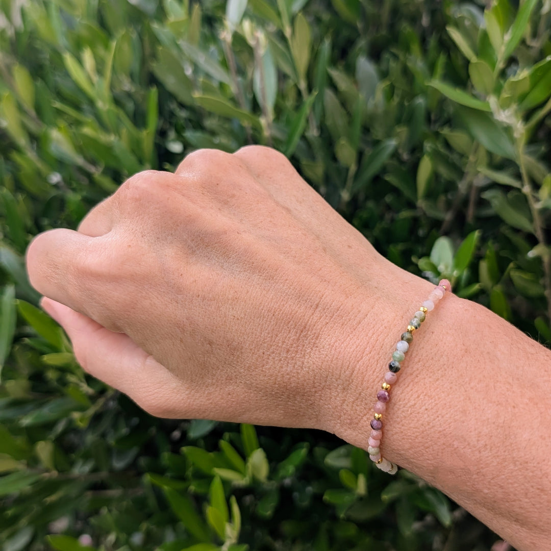 Watermelon tourmaline and gold bead bracelet