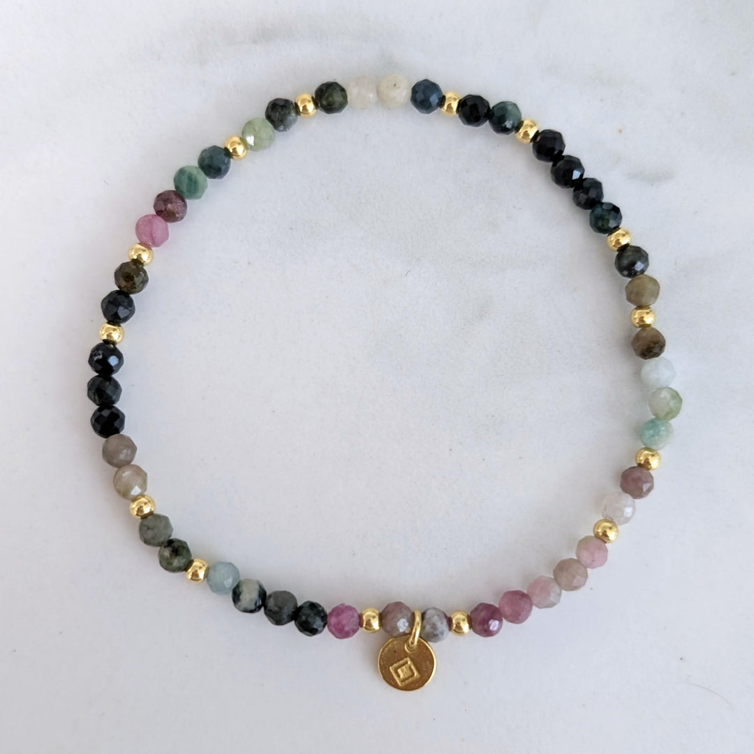 watermelon tourmaline and gold bead bracelet