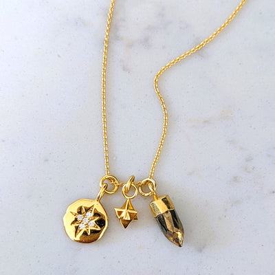 gold celestial gemstone and charm pendant necklace