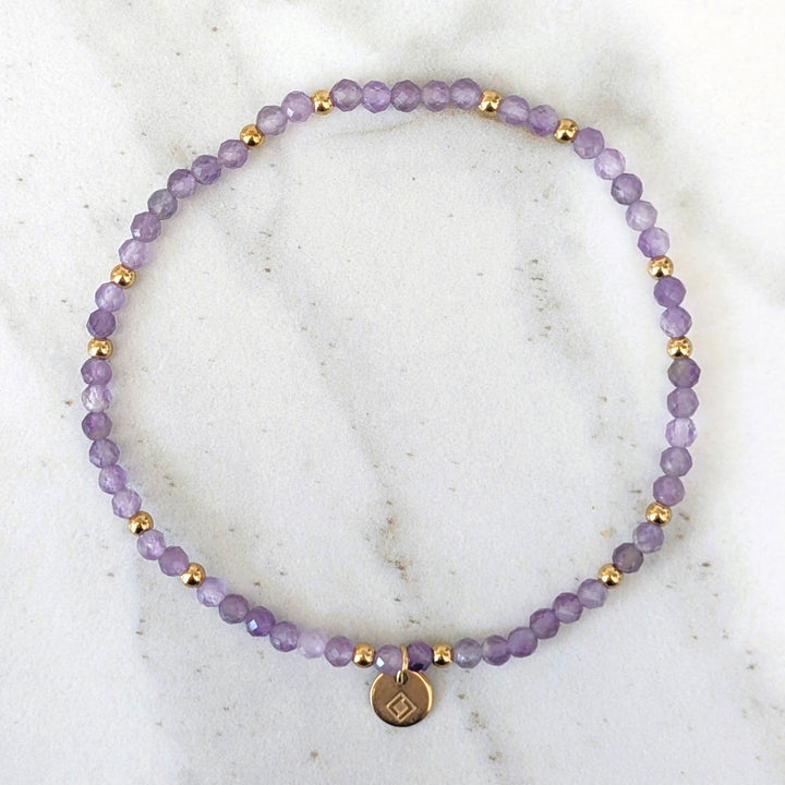 purple amethyst February birthstone gemstone and gold bead bracelet 
