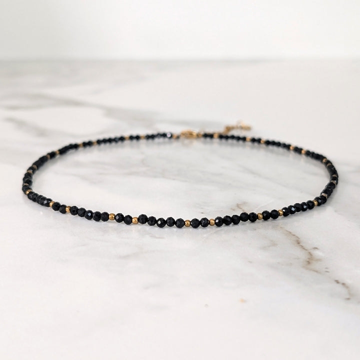 black tourmaline gemstone and gold bead faceted bead necklace 