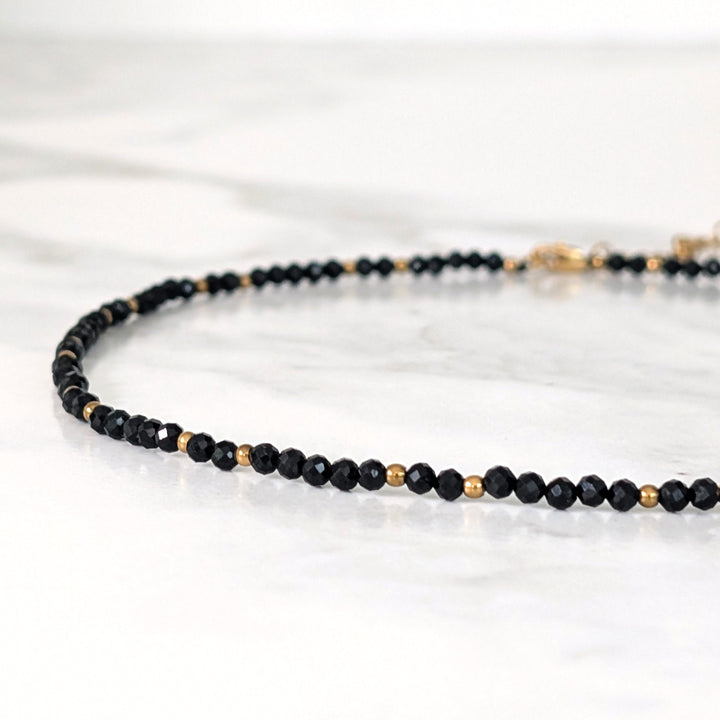 black tourmaline gemstone and gold bead faceted bead necklace 