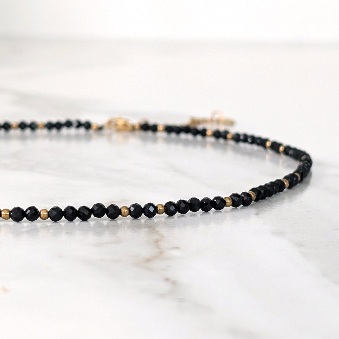 black tourmaline gemstone and gold bead faceted bead necklace 