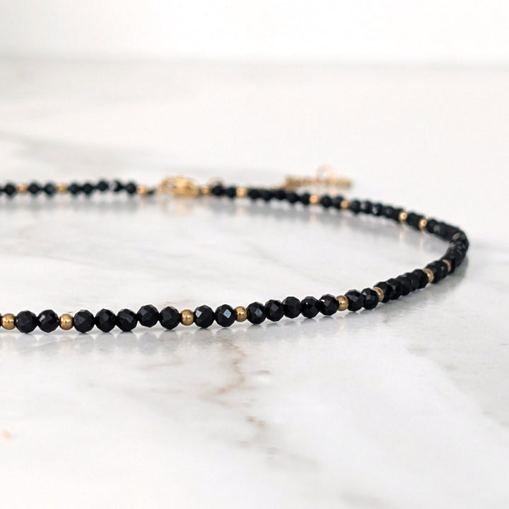 black tourmaline gemstone and gold bead faceted bead necklace 