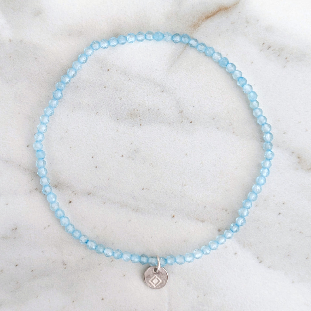 skinny blue topaz 2mm faceted bead gemstone bracelet 