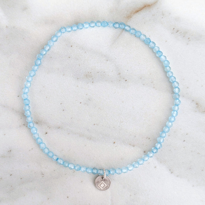 skinny blue topaz 2mm faceted bead gemstone bracelet 