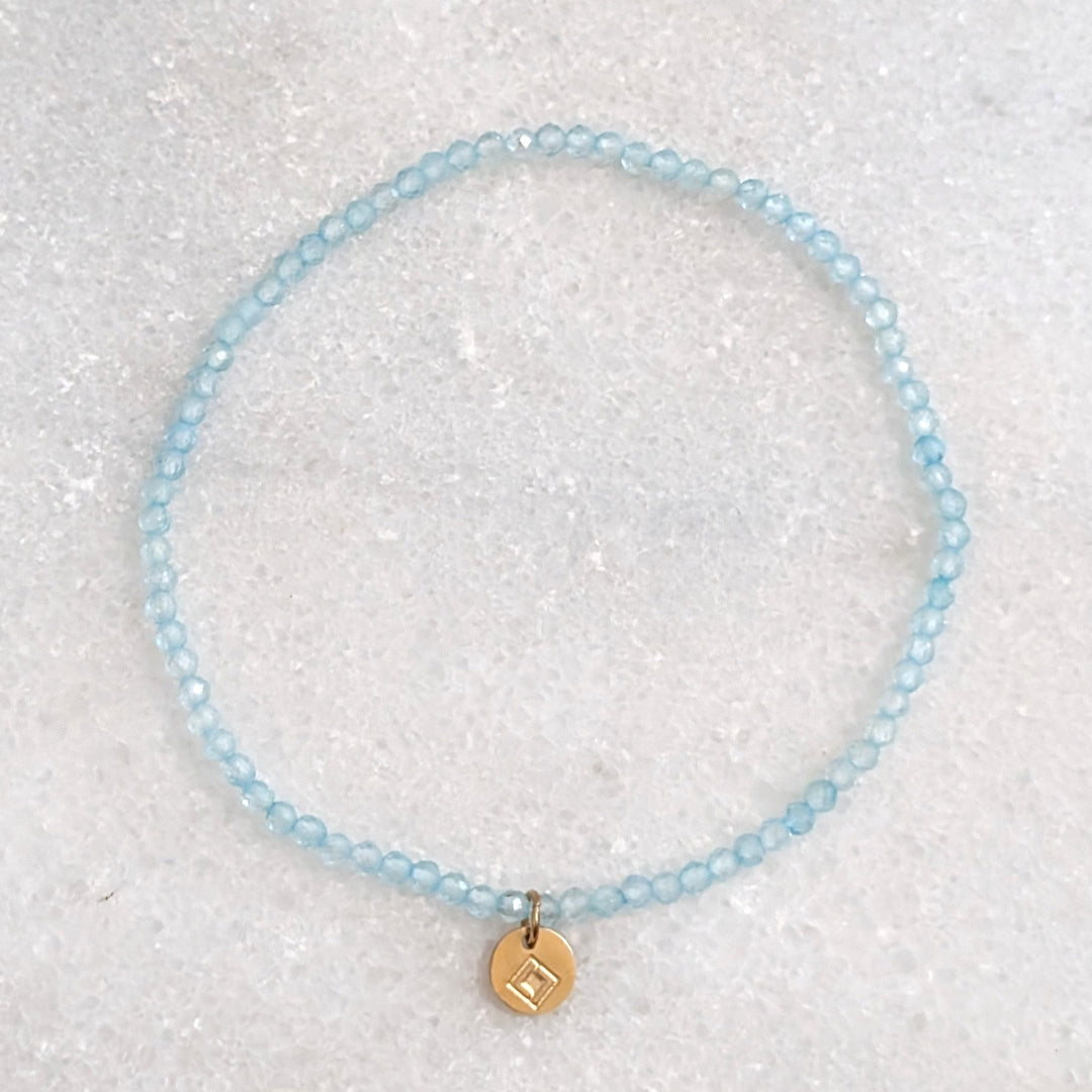 blue topaz skinny gemstone bracelet with 2mm faceted beads
