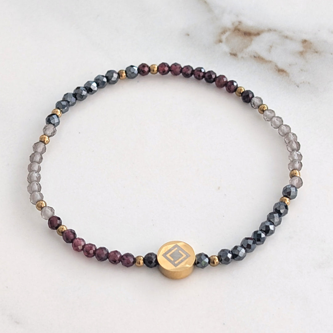 Garnet, smokey quartz and hematite Capricorn zodiac gemstone bracelet