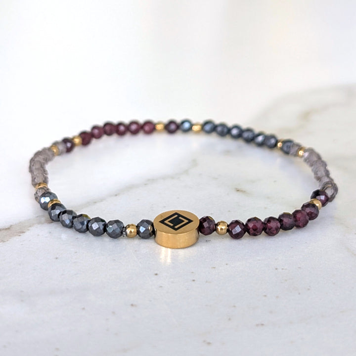 Garnet, smokey quartz and hematite Capricorn gemstone bracelet