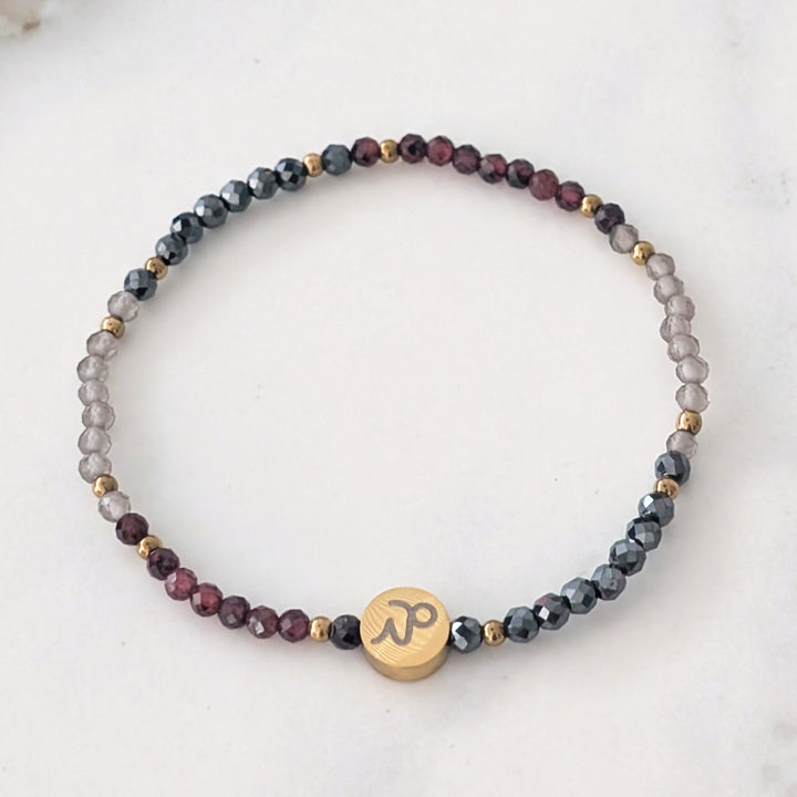 Garnet, smokey quartz and hematite Capricorn zodiac gemstone bracelet
