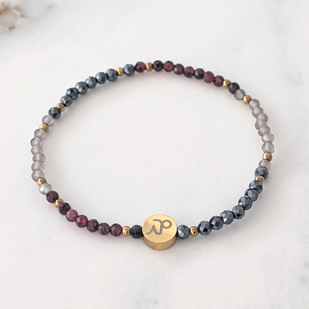 Garnet, smokey quartz and hematite Capricorn zodiac gemstone bracelet