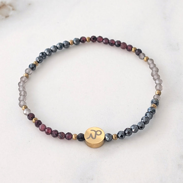Garnet, smokey quartz and hematite Capricorn zodiac gemstone bracelet