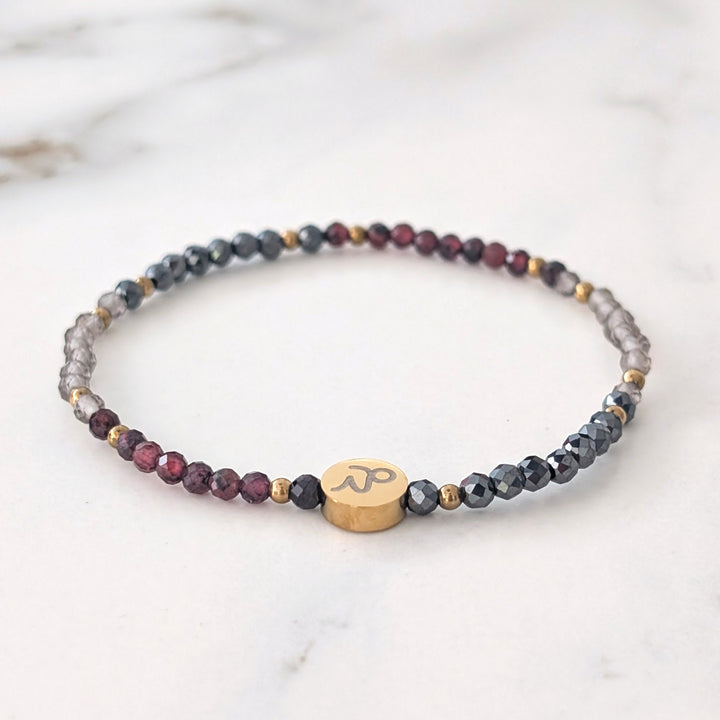 Garnet, smokey quartz and hematite Capricorn zodiac gemstone bracelet