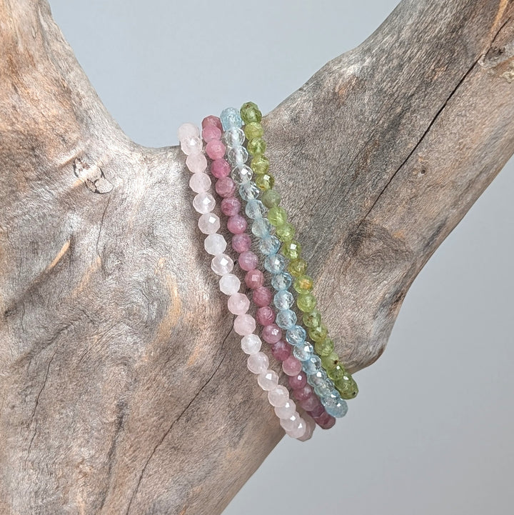 Celebrate friendship gemstone intention bracelet set. Peridot, rose quartz, blue topaz and peridot gemstone bracelets. 