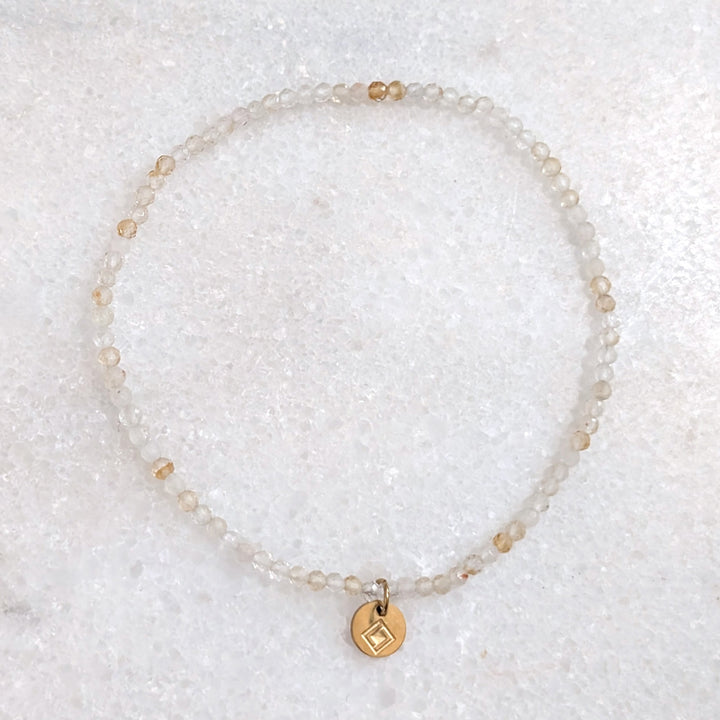 skinny citrine gemstone bracelet with 2mm faceted beads