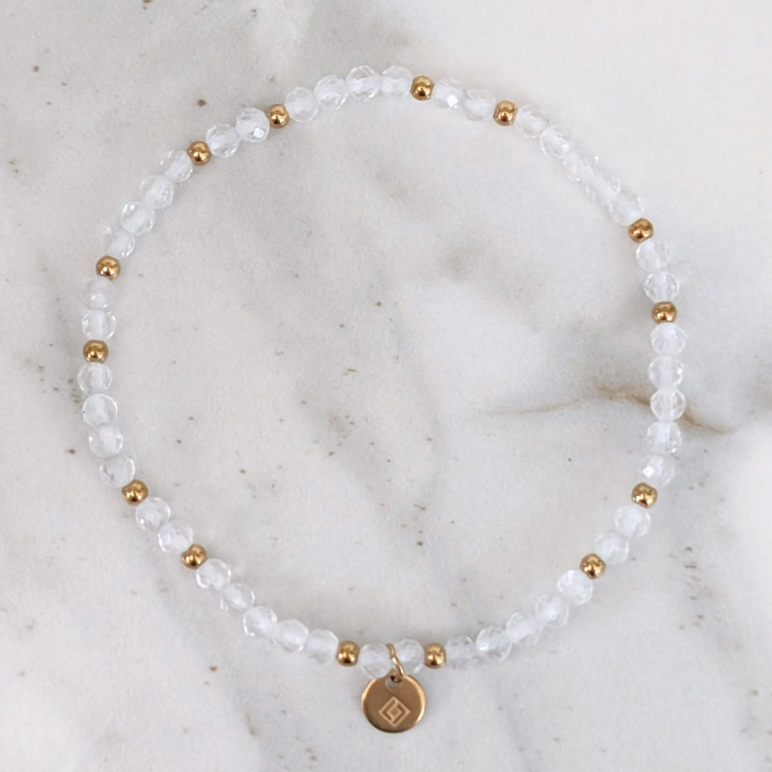 Clear quartz gemstone and gold bead April birthstone bracelet 