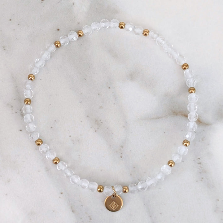 Clear quartz gemstone and gold bead April birthstone bracelet 