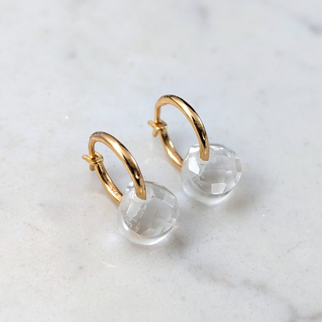 Gold hoop earrings with clear quartz faceted gemstone charms
