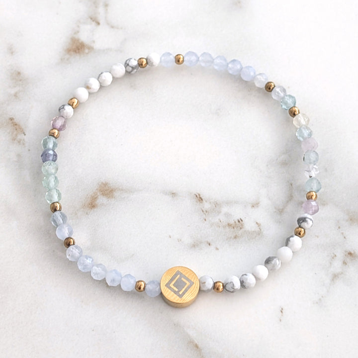 Gemini zodiac gemstone bracelet with fluorite, white howlite and blue lace agate gemstone beads.