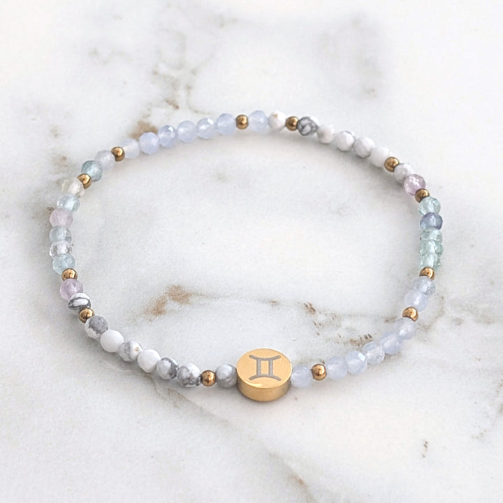 Gemini zodiac gemstone bracelet with fluorite, white howlite and blue lace agate gemstone beads.