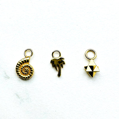 Ammonite, palm tree and tetrahedron gold necklace charms