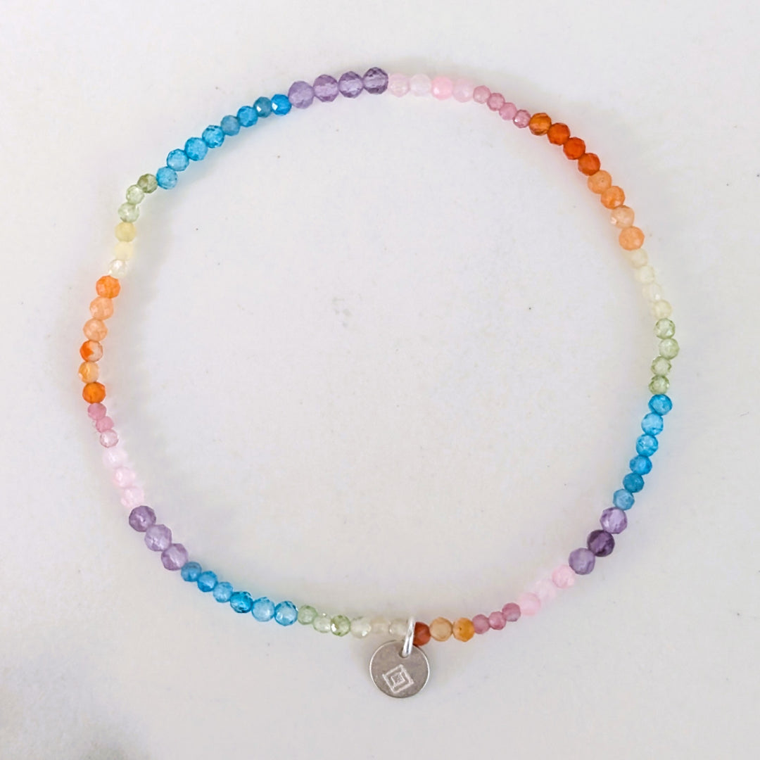 Good Vibes rainbow gemstone bracelet with 2mm faceted beads