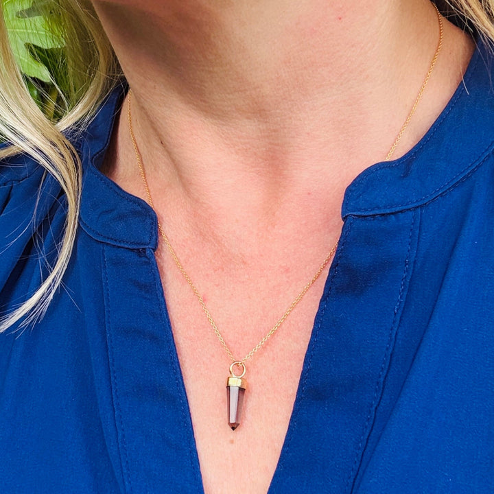 Gold necklace with a smoky quartz spike pendant 