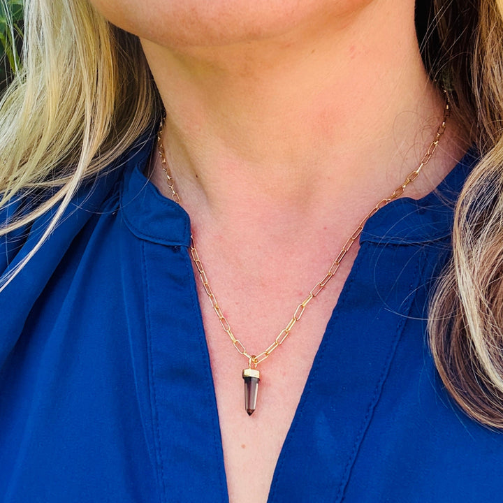 Gold paperclip necklace with a smoky quartz spike pendant 