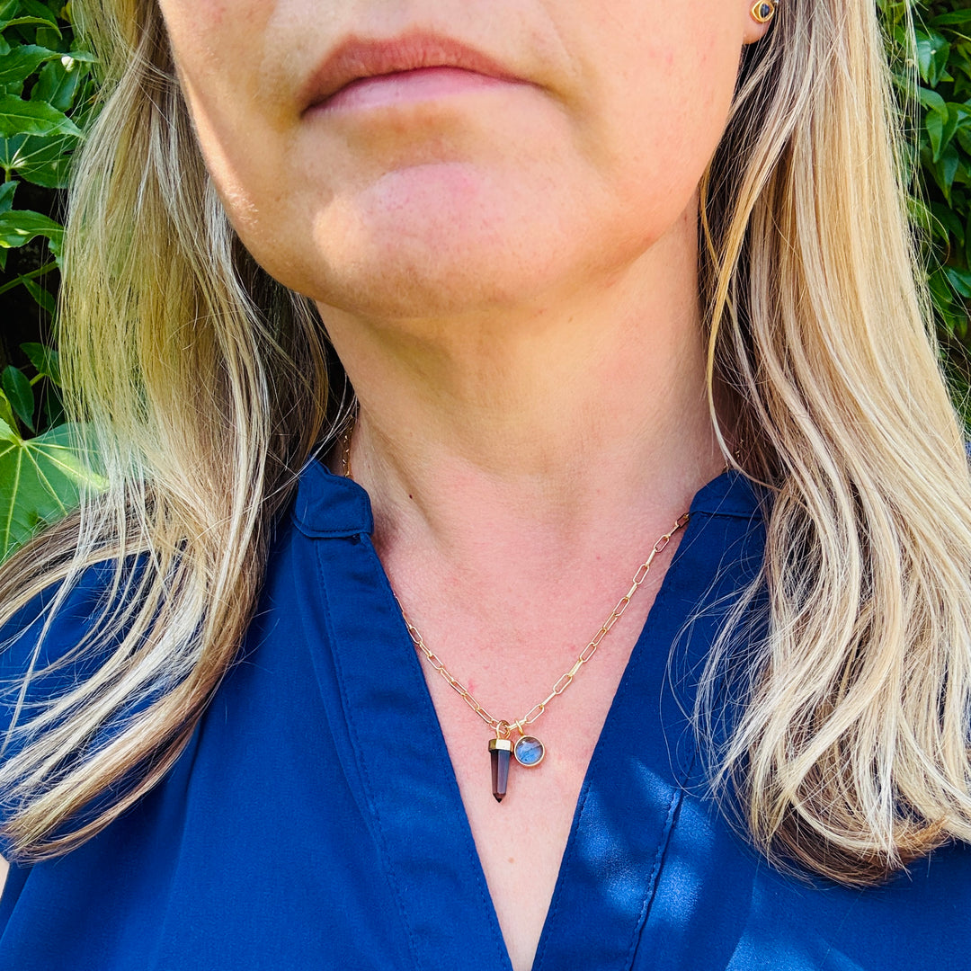 Gold paperclip necklace with a smoky quartz spike pendant and a labradorite gemstone charm