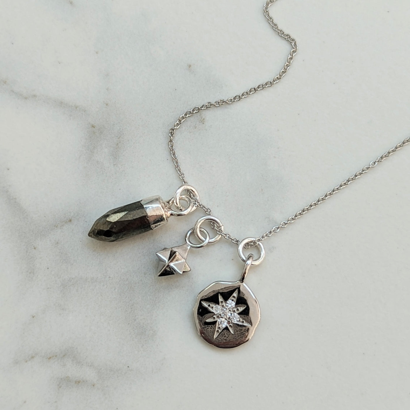 Pyrite, tetrahedron and celestial star disc sterling silver necklace