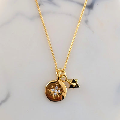 gold celestial star disc and charm necklace