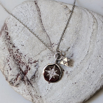silver star disc and charm necklace