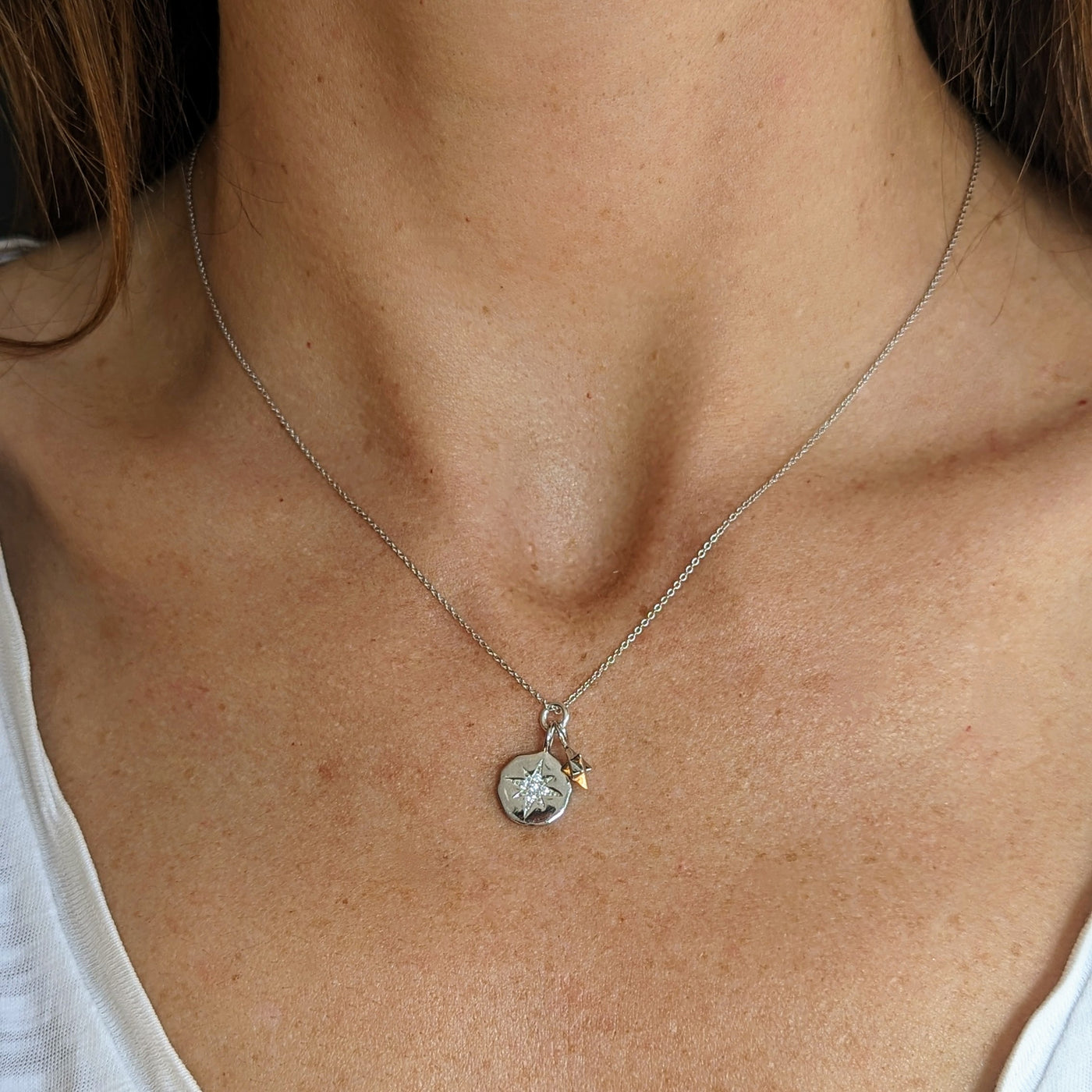 silver star disc and charm necklace
