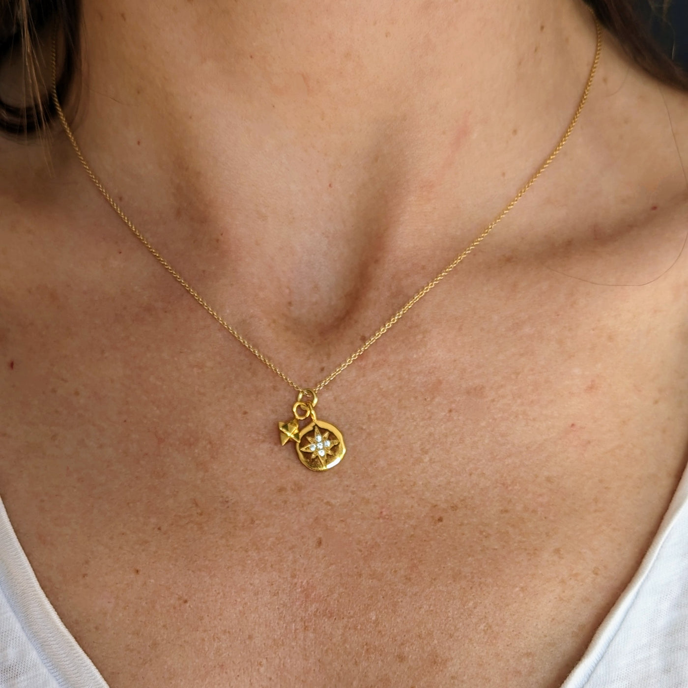 gold celestial star disc and charm necklace