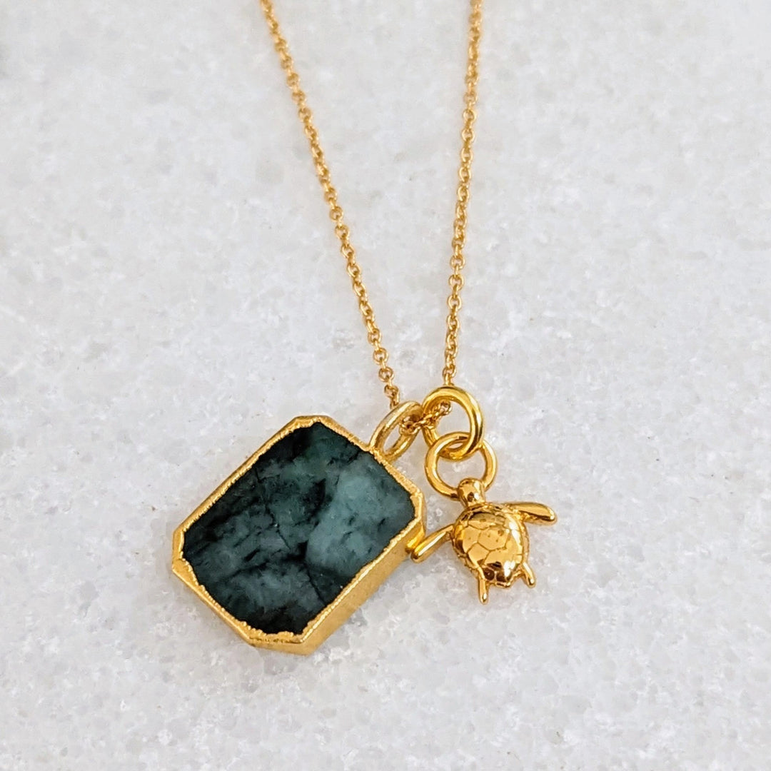 18 carat gold plated emerald and turtle pendant necklace
