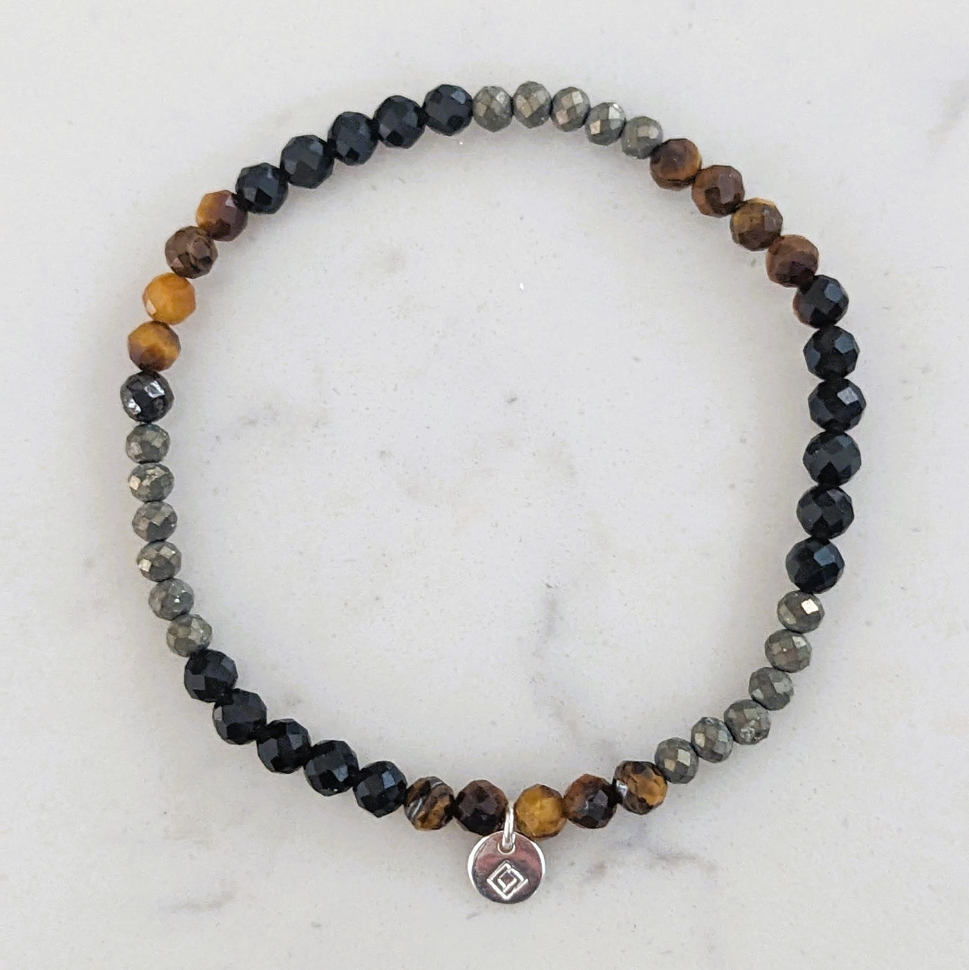 3mm faceted pyrite, tigers eye and obsidian gemstone bracelet